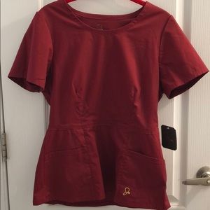 Deep maroon scrub top